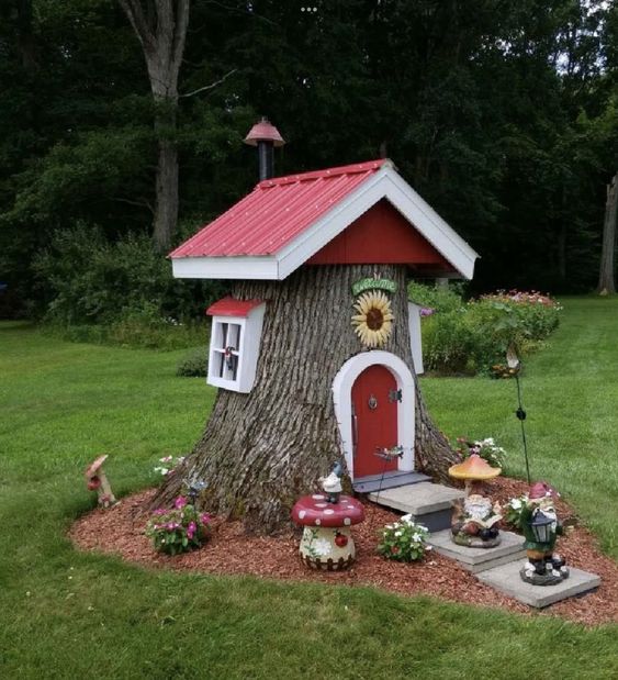 maison de gnome faites de troncs arbres 3