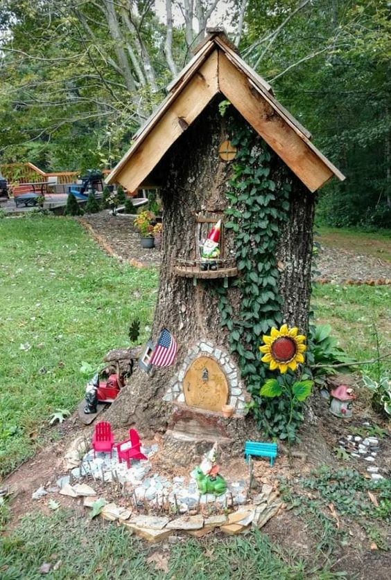 maison de gnome faites de troncs arbres 5
