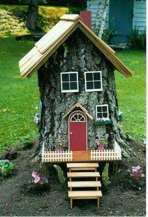 maison de gnome faites de troncs arbres 9
