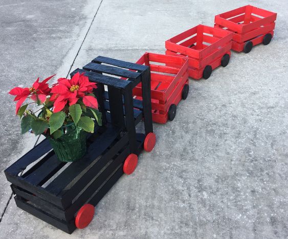 trains de noel fabriques avec des caisses en bois